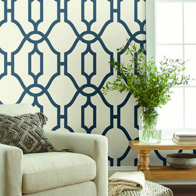 Dark brown pattern on beige wallpaper.